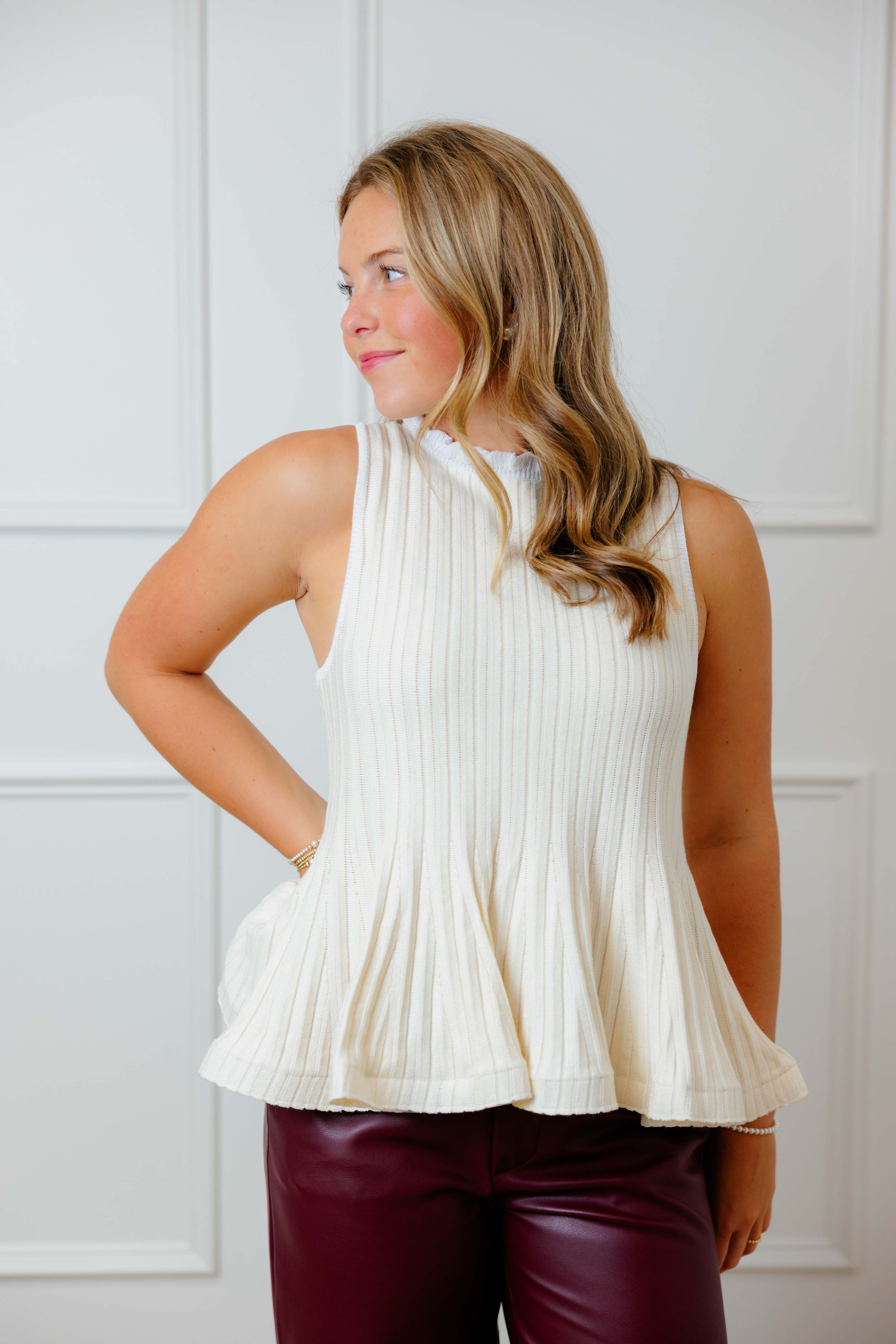 Cream Peplum Knit Top