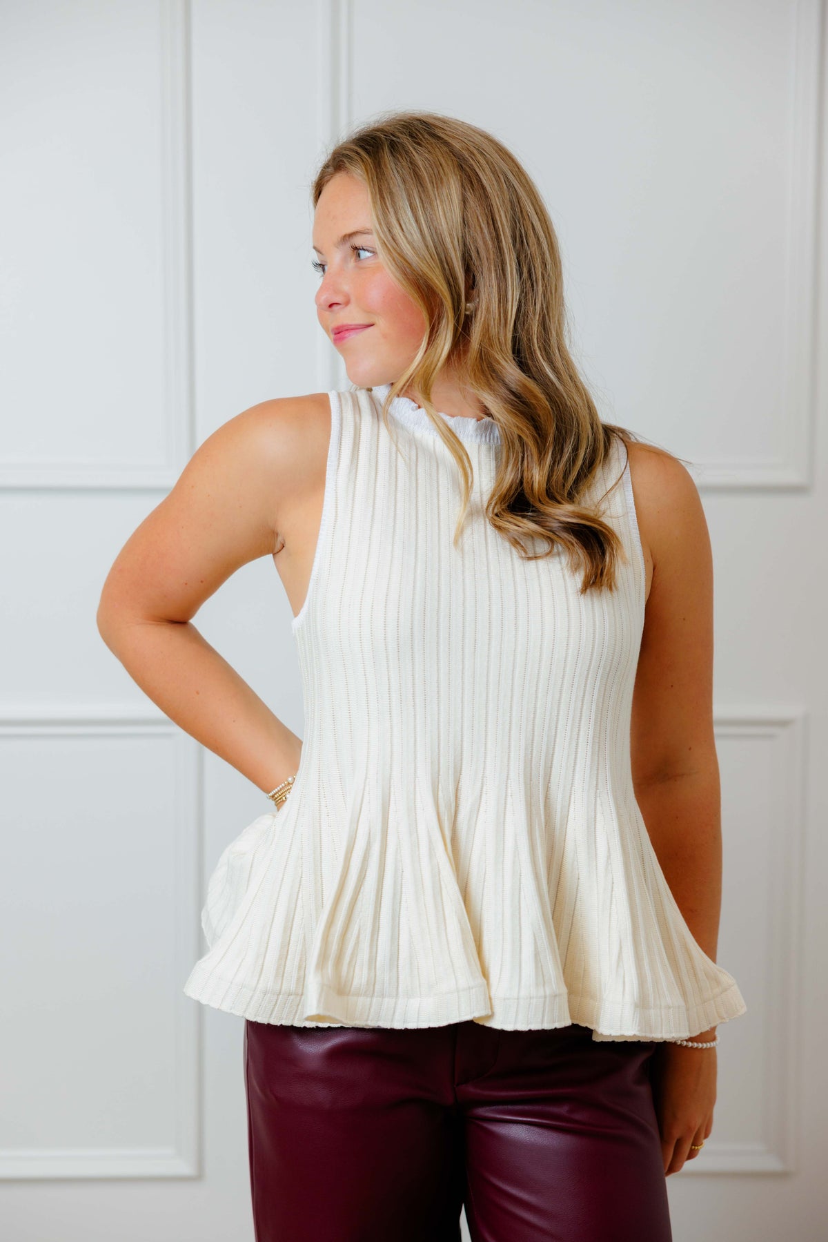 Cream Peplum Knit Top